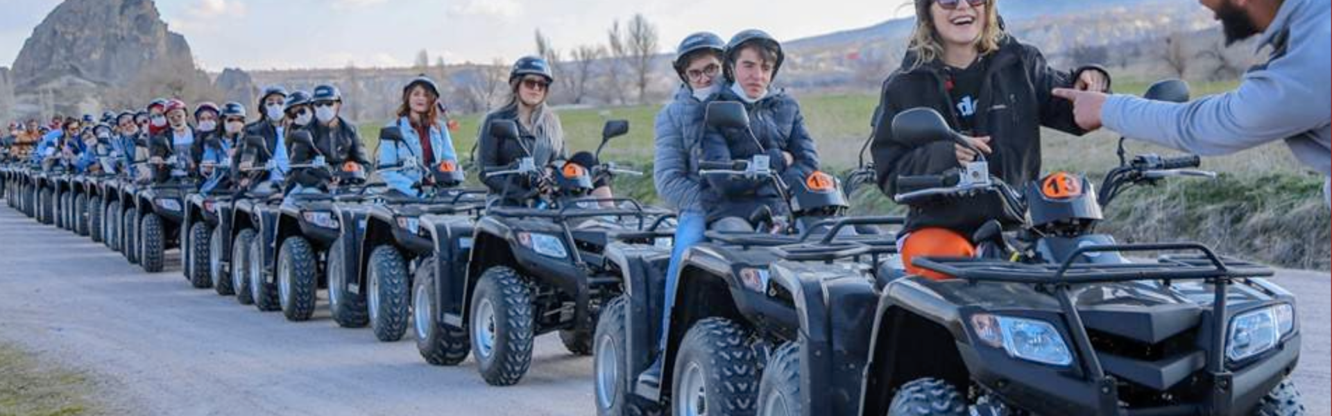 a group of people on atvs