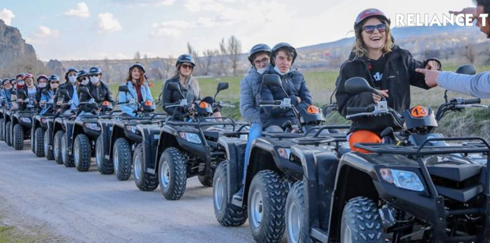 a group of people on atvs