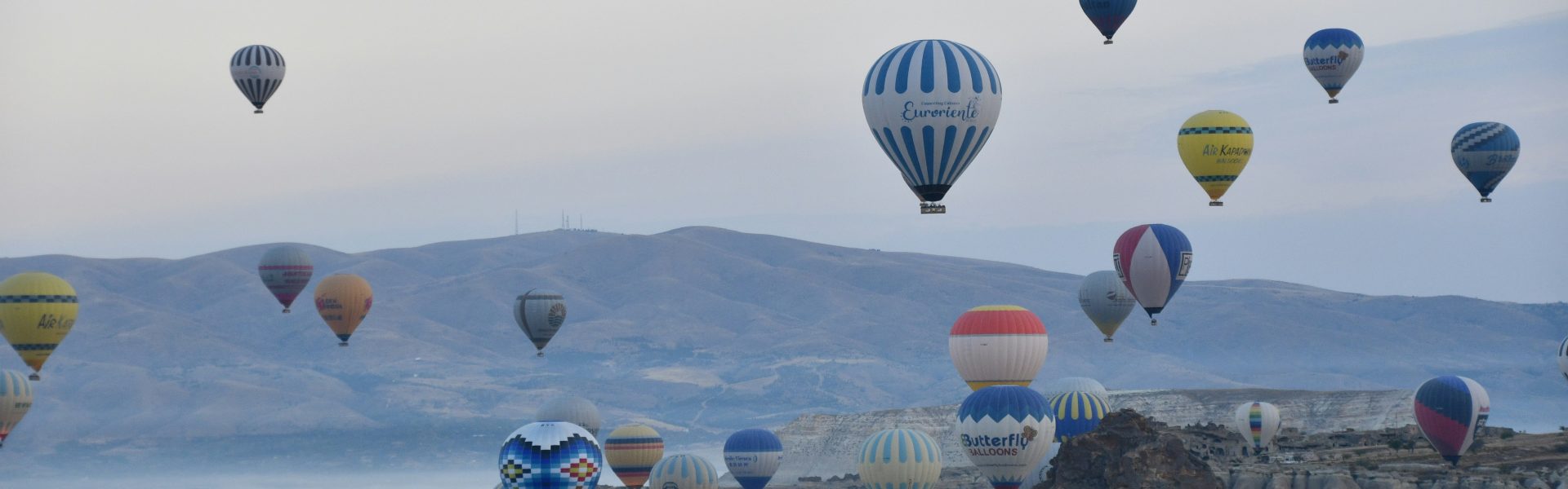 a group of hot air balloons in the sky