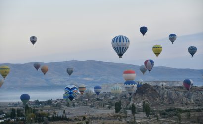 a group of hot air balloons in the sky