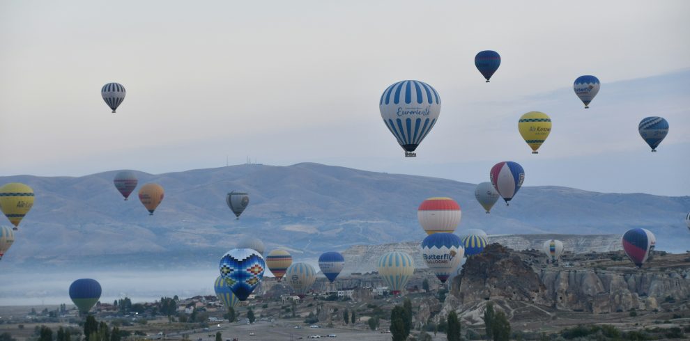 a group of hot air balloons in the sky